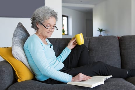 smiling-positive-retired-lady-excited-with-interesting-novel-1024x682